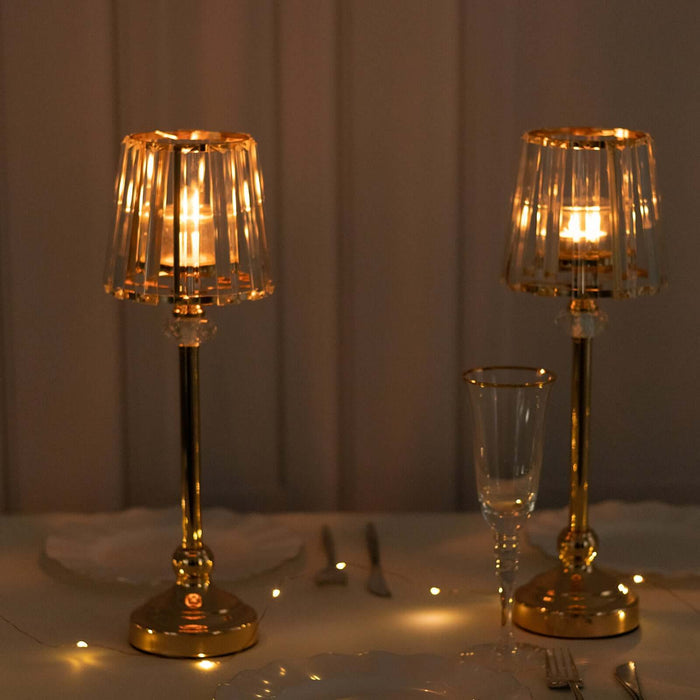 Elegant table lamps with crystal shades illuminating a cozy dining setting.