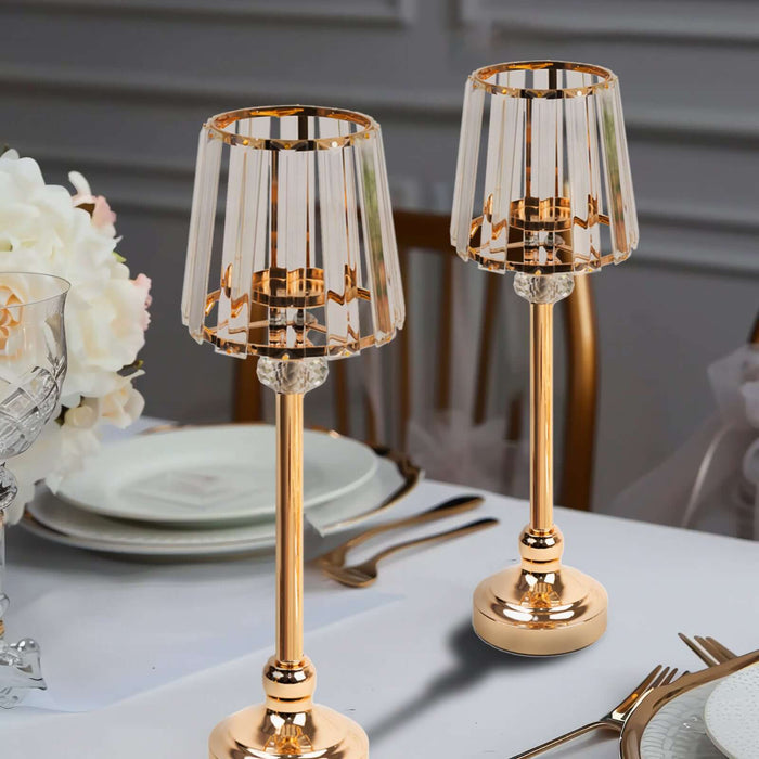 Elegant gold table lamps with crystal details, set on a dining table.