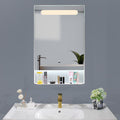 Framed LED bathroom mirror with storage shelf and motion sensor, 22x34