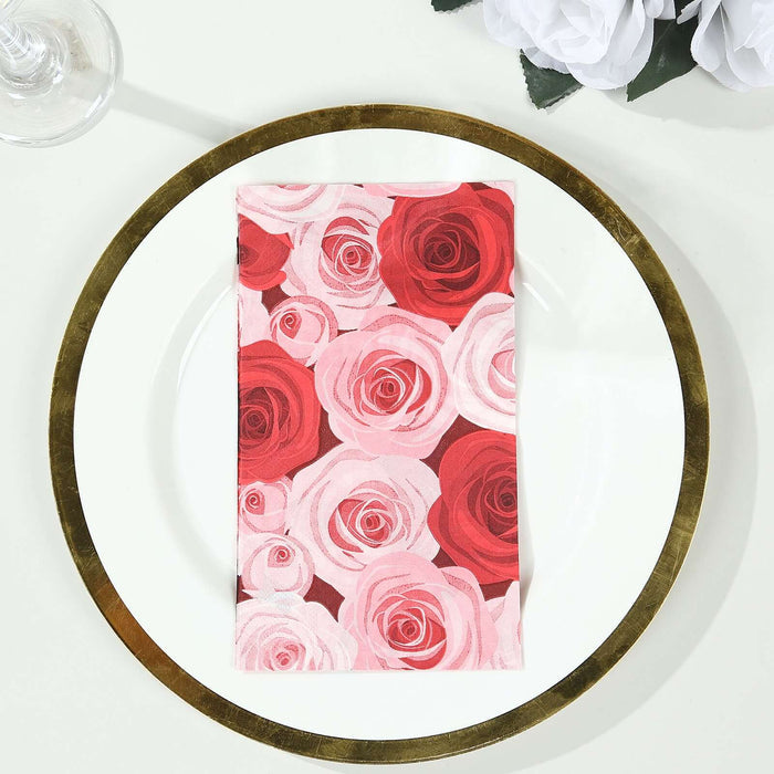Rose-patterned napkin on a decorative plate.