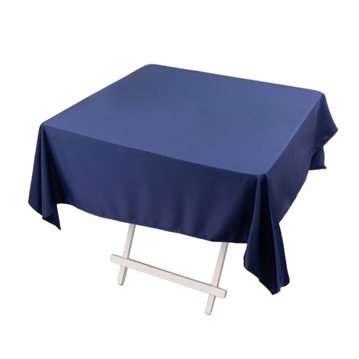 Navy blue tablecloth draped elegantly over a square table