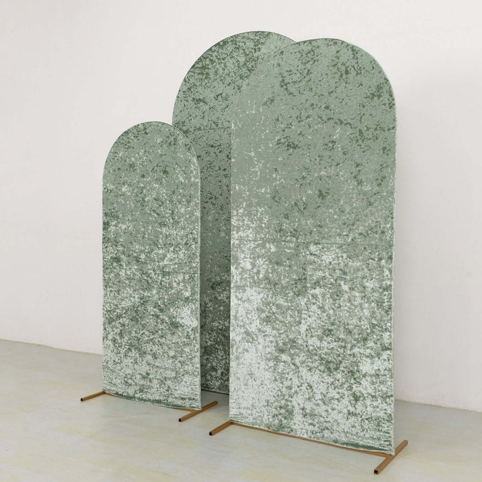 Textured green arch panels on stands against a plain background.